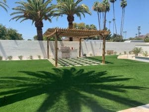 Outdoor Kitchen Pergola Under Palm Trees